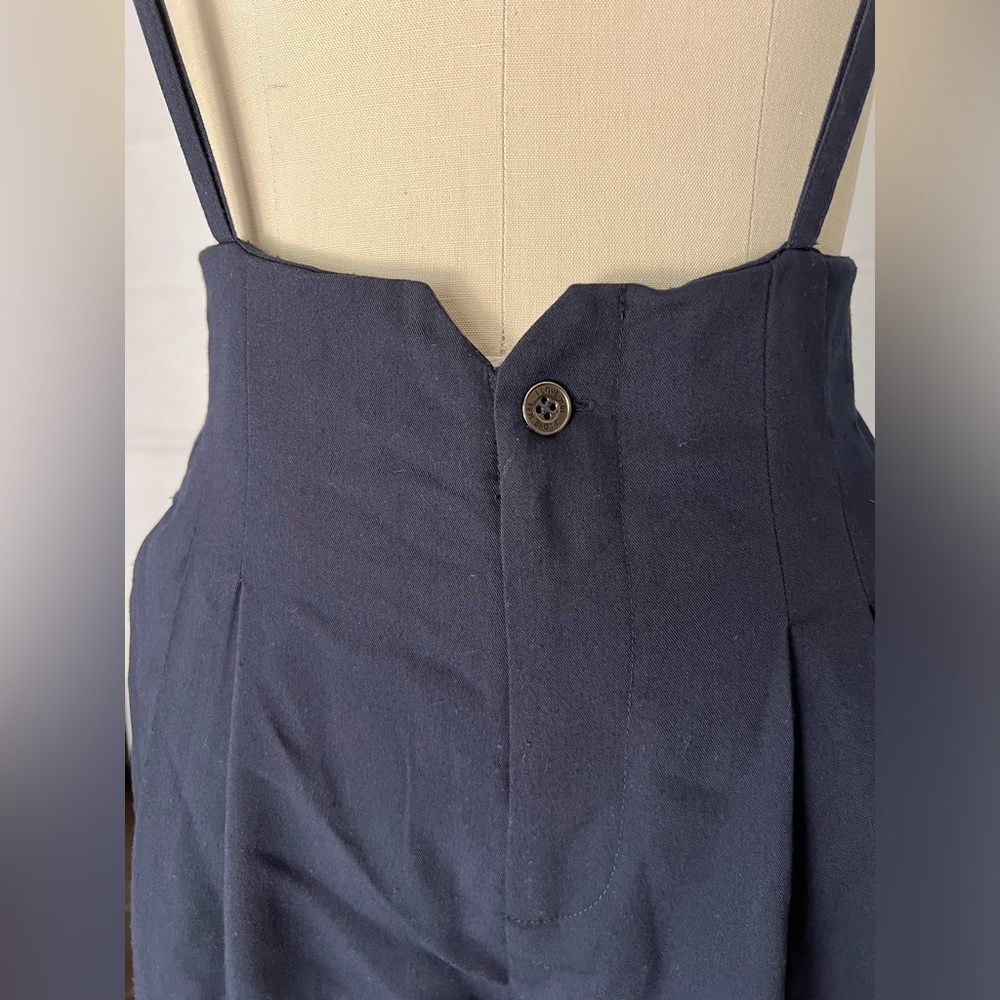 Forever 21. Women’s size 25. Navy blue trousers with straps .
